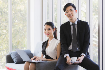 Asian business people posing in office..