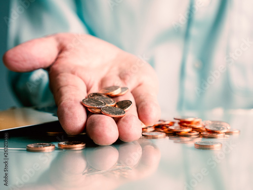 Fotografía Selective focus of copper coins on hand , Concept for money and business