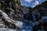 Fototapeta Łazienka - Waterfall in the Swiss mountains