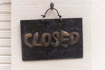 Wall Mural - Closed sign in a shop