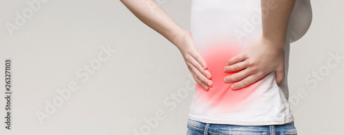 Fotomural Kidney inflammation, woman suffering from acute backache