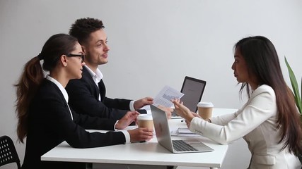 Wall Mural - Diverse business executive team talking brainstorming at office meeting