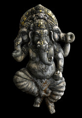 Ancient Ganesha statue isolated on black background with clipping path