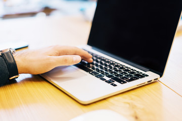 Poster - man using empty laptop screen on table