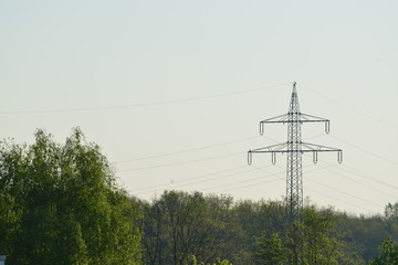 power pylons in germany on a sunny morning