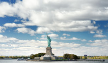 Panorama Of Island Of Liberty With Statue Of Liberty Seen From The Ferry In The Hudson River. Symbol Of The New York.