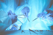 © rogerphoto - Group of surgeons at work while operating at hospital, close-up of hands. Health care and veterinary concept