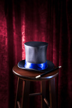 High Contrast Image Of Magician Hat And Wand On Stage