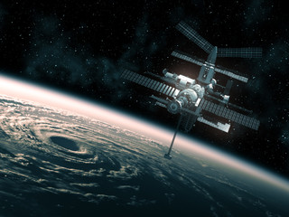 Wall Mural - flight of the space station above the big hurricane
