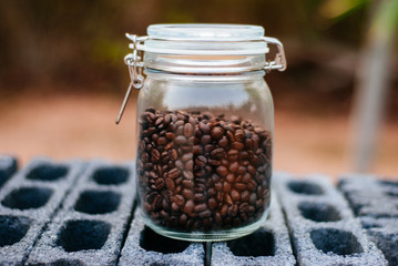 Wall Mural - Roasted coffee bean in Nice Glass Jar