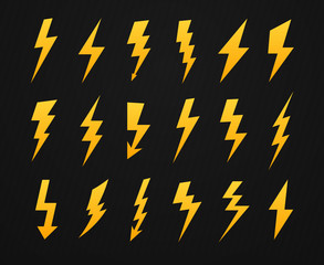 Wall Mural - Yellow lightning silhouette. Electrical power high voltage, thunderbolt flash and energy lightnings silhouettes icons vector set