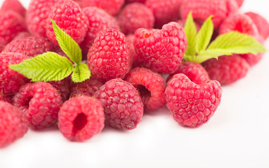 Poster - Raspberry with leaves isolated on white background