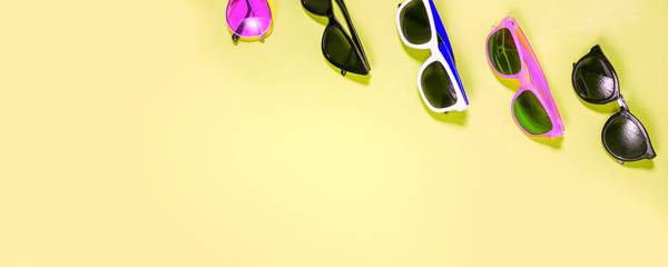 Poster - Variety of sunglasses over colorful background