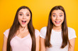 © deagreez - Close up photo two people beautiful funny funky she her models ladies yelling favorite football team goal lucky is it true really wear white pink casual t-shirts isolated yellow background