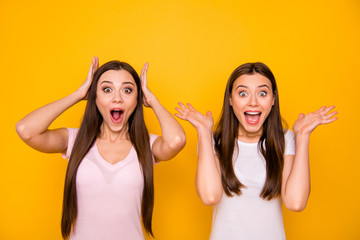 Wall Mural - Portrait charming cute astonished ladies people travel impressed by incredible news discounts information yelling open mouth placing hand near head wearing pastel outfit isolated vivid background