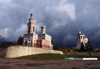 Wall Mural - Church in the autumn landscape of the city. The Church dome surrounded by beautiful autumn trees.  Details and close-up.