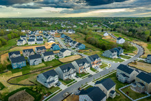 Aerial Panorama Of New Construction Luxury Residential Neighborhood Street With American Single Family Homes In Maryland USA Real Estate