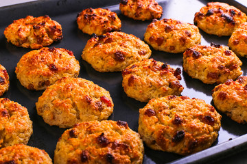 Baked cottage cheese and oatmeal cookies with raisins. Healthy nutrition, diet food.