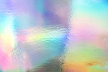 Holographic Foil Paper Close-up. Modern Trendy Background