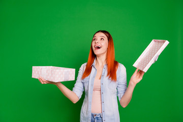 Wall Mural - Portrait of beautiful cute attractive millennial hold hand big box ribbon anniversary 8-march 14-february yell look astonished impressed wear jeans modern clothes isolated on green background