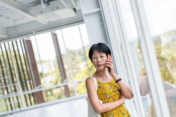 Poster - mature Asian woman talk on cellphone