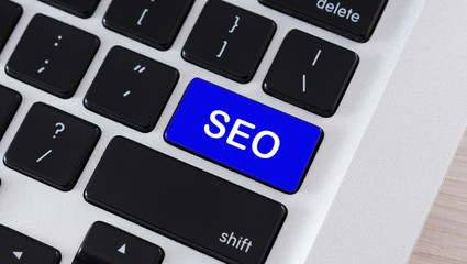 Aufkleber - SEO text on blue button of computer keyboard