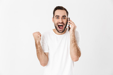 Wall Mural - Handsome cheerful man wearing blank t-shirt