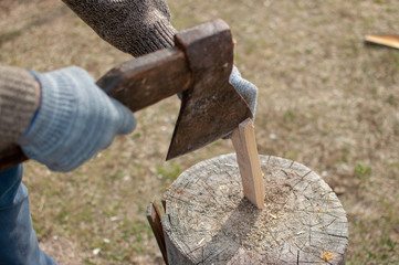 with an axe chopping wood