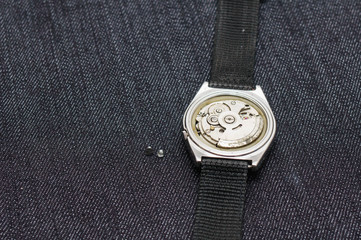 Closeup machine watch using as a background or wallpaper