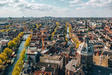 Wall Mural - beautiful aerial amsterdam view from above with many narrow canals, streets and architectures.