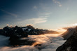 © Chris Zielecki/Stocksy - Beautiful landscape of high mountains in clouds