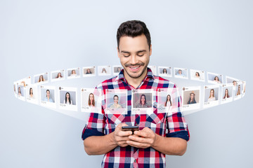 Close up photo glad he him his guy hold telephone having chat arrange blind date internet choose choice illustration pictures girls dating site futuristic creative design isolated grey background