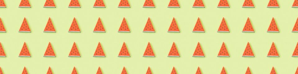 Sticker - panoramic shot of pattern with handmade paper watermelon slices isolated on green