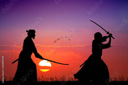 Carta da parati  two Samurai with sword at sunset