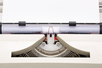 Fototapete - Close-up of a typewriter from the 70s with blank paper for text.