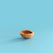 Half walnut shell on blue background
