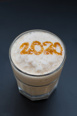 Wall Mural - Ice coffee blender and number 2020 on top. Happy new year concept