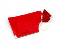 Empty Red Sachet Be Ripped And Sugar On White Background