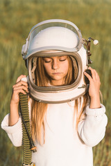 kid with astronaut helmet