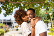 © Samuel B. - Outdoor protrait of black african american couple kissing each other