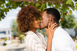 © Samuel B. - Outdoor protrait of black african american couple kissing each other