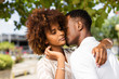 © Samuel B. - Outdoor protrait of black african american couple kissing each other
