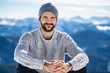 © Westend61 - Germany, Bavaria, Brauneck, portrait of smiling man in winter in the mountains