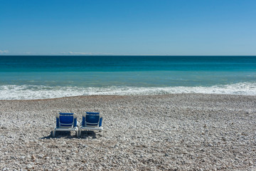 two chairs on the beach