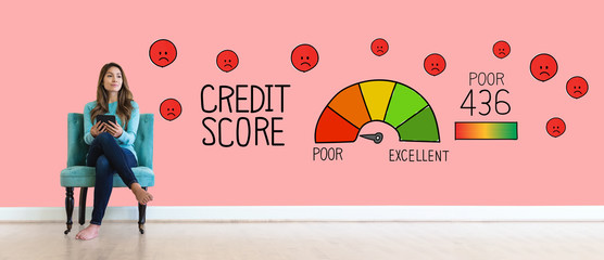 Wall Mural - Poor credit score theme with young woman holding a tablet computer
