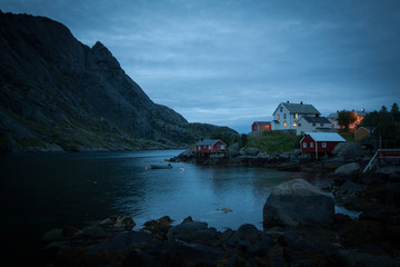 A moody fishing village at dusk on Lofoten Island, above the arctic cirle in Norway