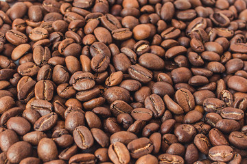  Background of coffee beans. Coffee is on the table