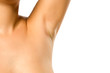 woman shows her smooth armpit on white background