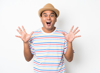 Happy young asian man celebrates with two hand in the air on isolate white background.