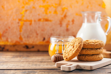 Wall Mural - Oatmeal cookies with milk and honey